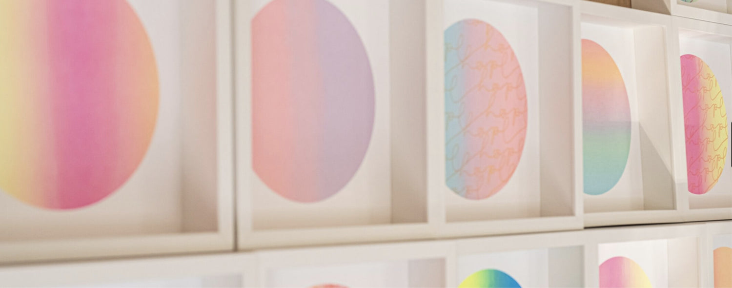 Framed art prints in a row